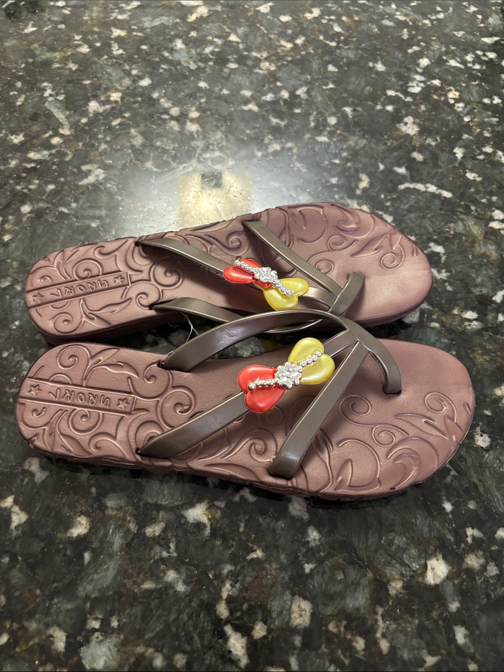 Sporto Brown Floral-Embossed Flip Flop Sandals with Red & Yellow Heart Charms